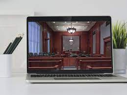 laptop with court room view